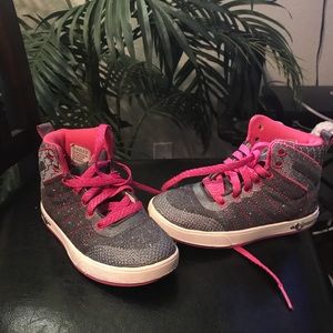 Pink and grey Skechers boots